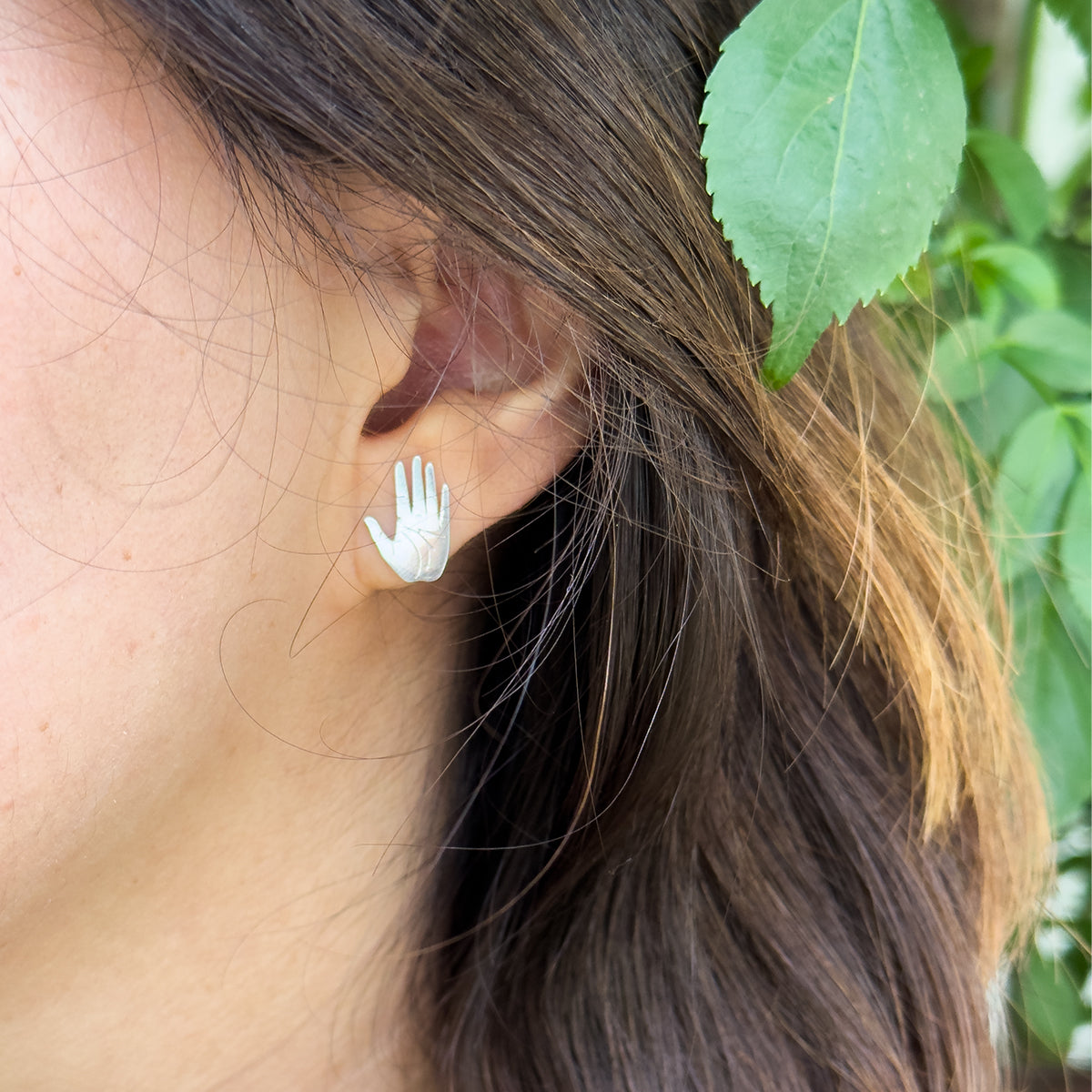Aretes Manos